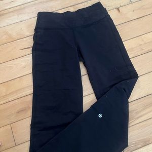 Black cross top Lululemon leggings